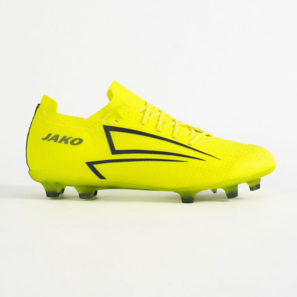 5550_676_P07 Bright yellow Jako soccer cleat with black geometric side graphic and studs visible underfoot.
