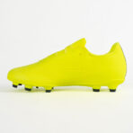 Side view of a neon yellow soccer cleat with studded outsole on a white background.