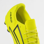 Bright neon yellow soccer cleat with black chevron stripes and laces (close-up of upper