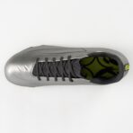Top view of a gray athletic shoe with black laces, showing a lime inner lining and a black-and-yellow logo at the heel