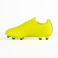 Bright yellow soccer cleat with molded studs, side view on a white background for firm-ground play.
