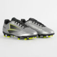 Silver and black soccer cleats with neon yellow studs, pair facing left on a white background