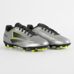Silver and black soccer cleats with neon yellow studs, pair facing left on a white background