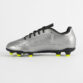 Side view of a silver soccer cleat with black laces and neon yellow studs on the sole.