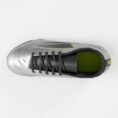 Top view of a metallic silver soccer cleat with black laces and lime green inner lining.