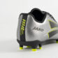 Rear view of a silver soccer cleat with neon yellow accents and the Jako logo on the heel area.